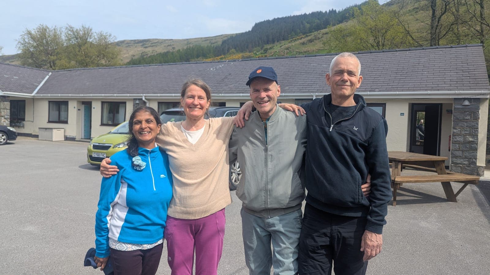 Rose and participants outside Snowdonia Mountain Lodge, April 2026